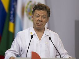 Santos destaca el compromiso de las FARC por un cese al fuego unilateral. AP / ARCHIVO