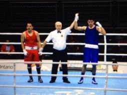 Romero sacó la cara por el país en la primera sesión de boxeo de los Juegos Panamericanos Toronto 2015. TWITTER / @COM_Mexico