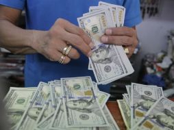 El tipo de cambio para solventar obligaciones en moneda extranjera es de 16.2681 pesos. EL INFORMADOR / ARCHIVO