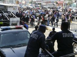 La Policía Federal vigiló las áreas cercanas al IEEPO ante posibles disturbios con los maestros de la Sección 22. EFE / M. Martínez