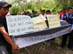 El domingo 19 de julio, un enfrentamiento en el municipio de Ostula dejó el saldo de un niño muerto. AFP / ARCHIVO