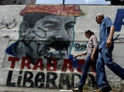 HRW dice que el gobierno de Maduro ha detenido, amenazado o acusado de cargos criminales a quienes lo han criticado. AP / ARCHIVO