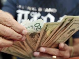 El Banxico indica que el tipo de cambio para solventar obligaciones es de 16.1645 pesos. EL INFORMADOR / ARCHIVO