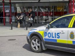 El recinto fue acordonado y se procedió a su completo desalojo por las fuerzas de seguridad. EFE / P. Kruger