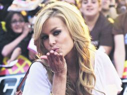 CARMEN ELECTRA. La guapa actriz visitó México para ser la madrina de una tienda de extensiones de cabello. AP /