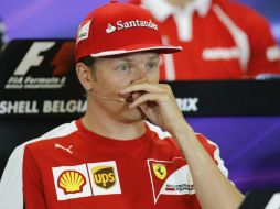 Kimi Raikkonen se mostró contento por pertenecer a su equipo. EFE / O. Hoslet