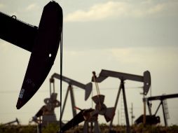 La agencia destaca la menor producción registrada en los países ajenos a la OPEP. AP / C. Riedel