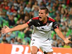 Bergessio celebra su primer gol en el futbol mexicano. MEXSPORT / E.Terrazas