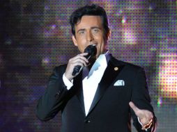 El vocalista interpretará boleros y música diferente a lo que hace con su agrupación, con la que en octubre lanzará un nuevo álbum. AFP / ARCHIVO