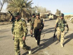 El país hoy. Militares realizan una operación para recuperar el control del distrito de Tamim en el Sur de Ramadi. AP /