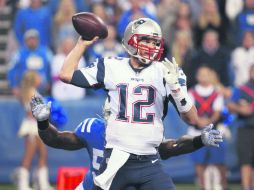 Tom Brady ha completado 139 pases de 197 intentos comandando la ofensiva de los Patriotas de Nueva Inglaterra. AP / J. Minchillo