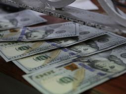 El tipo de cambio para solventar obligaciones denominadas en moneda extranjera pagaderas es de 16.4998 pesos mexicanos. EL INFORMADOR / ARCHIVO