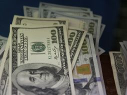 El tipo de cambio para solventar obligaciones denominadas en moneda extranjera pagaderas en el país es de 16.4503 pesos. EL INFORMADOR / ARCHIVO