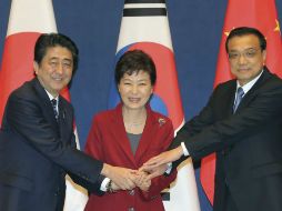 Los tres líderes se reunieron en medio de un cordial ambiente. AP / L. Jong-hoon
