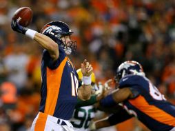 Manning llegó a 186 victorias en temporada regular y ayudó a que Denver mantenga marca perfecta, 7-0. AFP / J. Edmonds