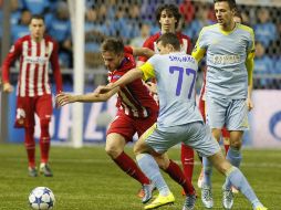 No pudieron hacerse daño y el Atleti se complicó la vida. AP / A. Filippov