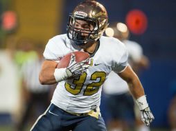 Los felinos se llevan el juego en el estadio Olímpico Universitario, en la semifinal de la ONEFA. MEXSPORT / ARCHIVO
