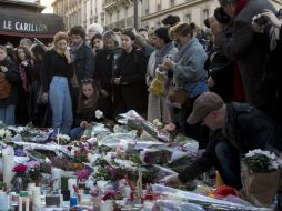 Entre los muertos figuran personas de disntintas nacionalidades, a las cuales, también se les rinde tributo. AP / P. Dejong