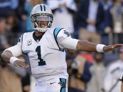 Cam Newton completó sus primeros 11 pases, algo inusitado en su carrera en la NFL. AFP / M. Zaleski