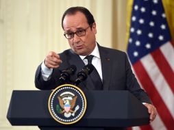 ''Pediremos a Putin que los ataques deben ser contra el Estado Islámico, contra el terrorismo'', apuntó el presidente galo. AFP / N. Kamm