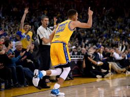Stephen Curry brilló con 24 puntos y nueve asistencias. AFP / T. Henderson