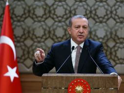 ''Apoyar al régimen que ejerce terrorismo de Estado, es jugar con fuego'', dice Erdogan. AP / K. Ozer