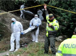 La policía encuentra el cuerpo de una mujer asesinada al parecer por Fredy Armando Valencia, llamado ''Monstruo de Monserrate''. EFE / A. Cárdenas