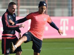 Thiago y su compañero Franck Ribery entrarán en la convocatoria. AFP / C. Stache