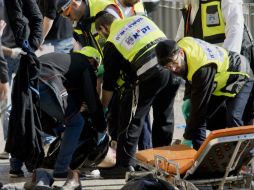 La policía mata a tiros a un agresor y detiene al segundo. AP / A. Schalit