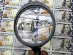 El peso continúa presionado, debido a una menor liquidez por el feriado de fin de año. AP / ARCHIVO