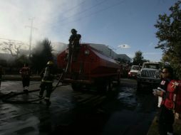 Tras poco menos de una hora de labores se logró controlar el incendio. EL INFORMADOR / R. Tamayo