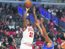 Preciso. Jimmy Butler (21) sigue dando la cara por los Bulls, que acumulan tres triunfos consecutivos. AP / J. Haynes