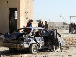 La explosión de un coche bomba dentro de un centro de entrenamiento de Policía causa la muerte de 65 personas y deja heridas a 200. AFP / M. Turquia