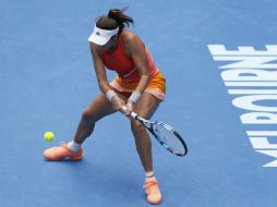 Garbiñe Muguruza, la tercera cabeza de la serie, se hizo del triunfo en 79 minutos. EFE /