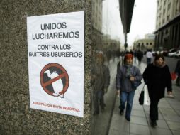 En las negociaciones también participan otros querellantes tenedores de bonos impagos llamados 'me too'. AP / ARCHIVO