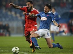 El griego Konstantinos Mitroglou aprovechó la ausencia de Jiménez y consiguió tres anotaciones. AFP / P. de Melo