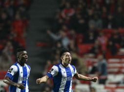 En el minuto 28 Layún dio un pase retrasado a Herrera, quien disparó raso de pierna derecha para batir al portero del Benfica. AFP / P. de Melo