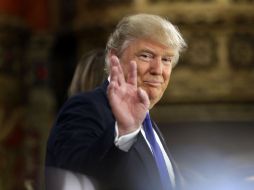 El precandidato presidencial republicano, Donald Trump, afirmó que Mitt Romney se acobardó durante las presentes elecciones. AP / C. Osorio