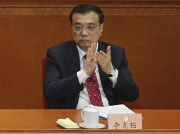 El primer ministro chino,  Li Keqiang, presenta ante el poder legislativo el informe de finanzas para este año. EFE / W. Hong