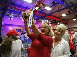 Simpatizantes del neoyorkino Donald Trump previo a un discurso del millonario en Madison, Misisipi. AP / B. Anderson