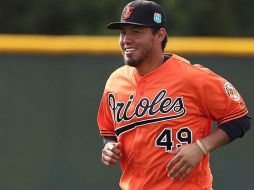 Yovani Gallardo (foto) fue relevado por Todd Redmond, quien pudo apagar el 'fuego' desatado por la ofensiva del rival. ESPECIAL / orioles.mlb.com