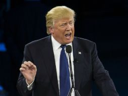 'Probablemente lo haré, pero quiero mejores acuerdos que los que estamos haciendo', asegura Trump. AP / E. Vucci