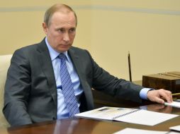 ''Aunque Putin no figura de facto, está claro que el objetivo principal de esta filtración son nuestro presidente'', señalan. AP / A. Druzhinin