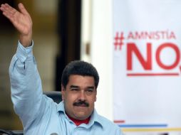 'Aprobado, ley de amnesia criminal no va', afirma Maduro. AFP / J. Barreto