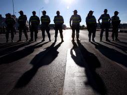 Agentes se preparan debido a las manifestaciones a favor y en contra. EFE / F. Bizerra