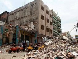 El terremoto en Ecuador que ocurrió el sábado pasado ha dejado 570 muertos y 163 desaparecidos. EFE / C. Escobar