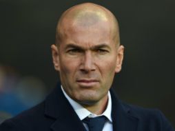 ''Estoy contento de lo que estamos haciendo pero, al mismo tiempo, quiero decir que nos falta mucho'', recalca Zidane. AFP / P. Ellis
