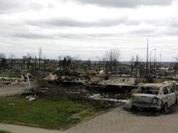 El incendio sigue creciendo, pero va hacia afuera de la ciudad y cubre unos dos mil 20 kilómetros cuadrados. AP / R. La Corte
