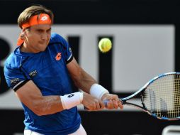 Luego de verse por debajo en el primer set, Ferrer consigue de manera complicada su boleto a la siguiente ronda. AP / E. Ferrari
