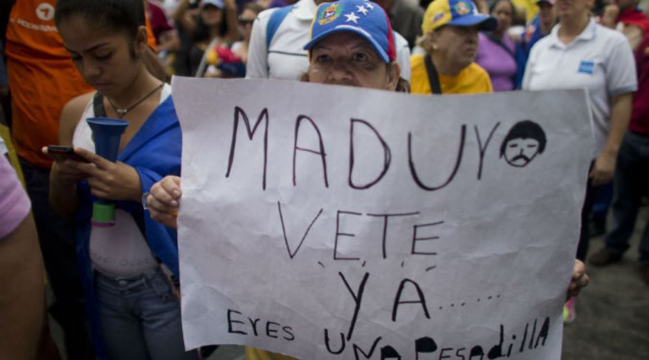 Se tiene previsto marchar a la sede del Consejo Nacional Electoral donde esperan entregar las 1.8 millones de firmas que recolectaron. AP / ARCHIVO